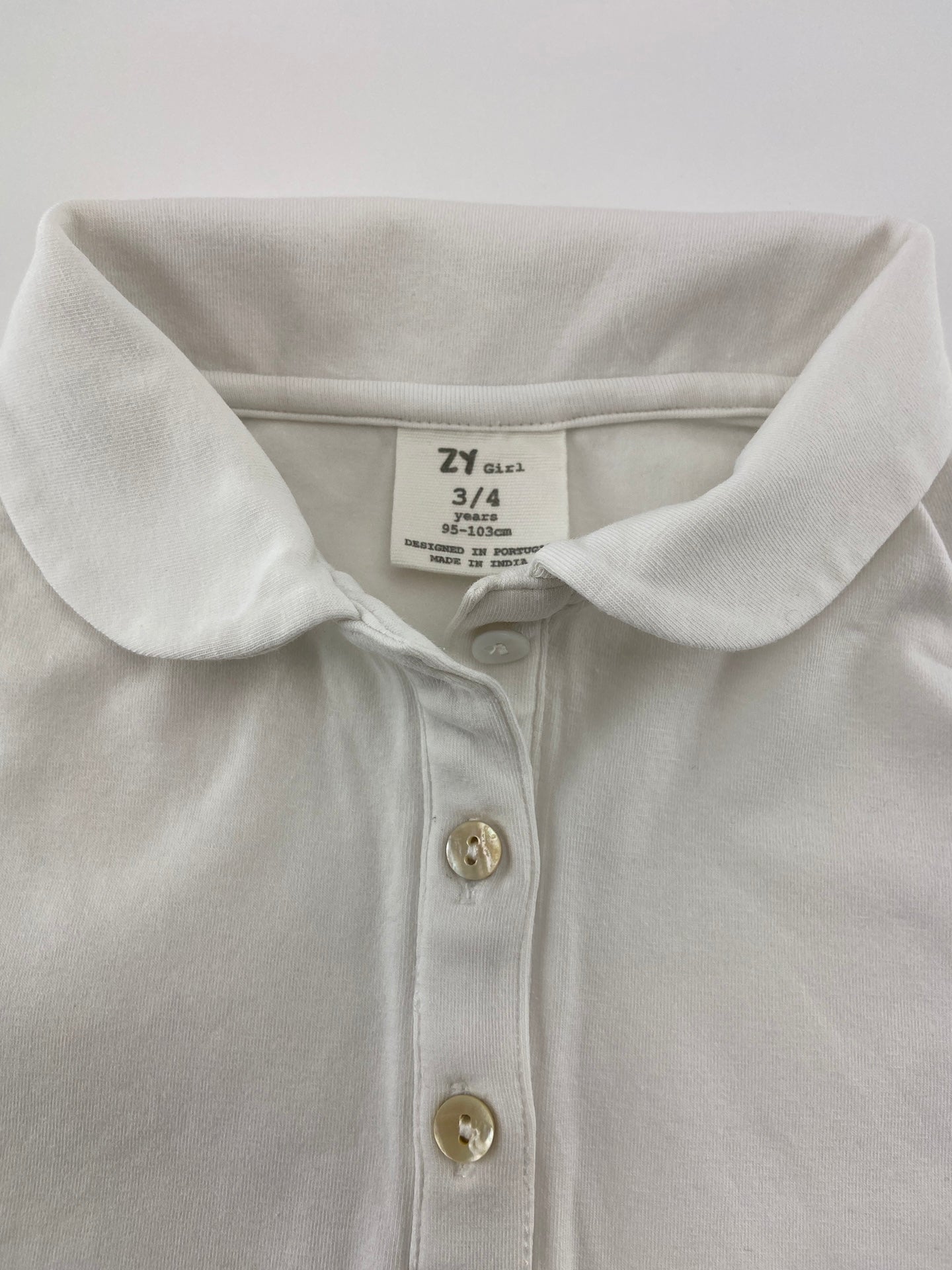 ZIPPY Polo gola redonda