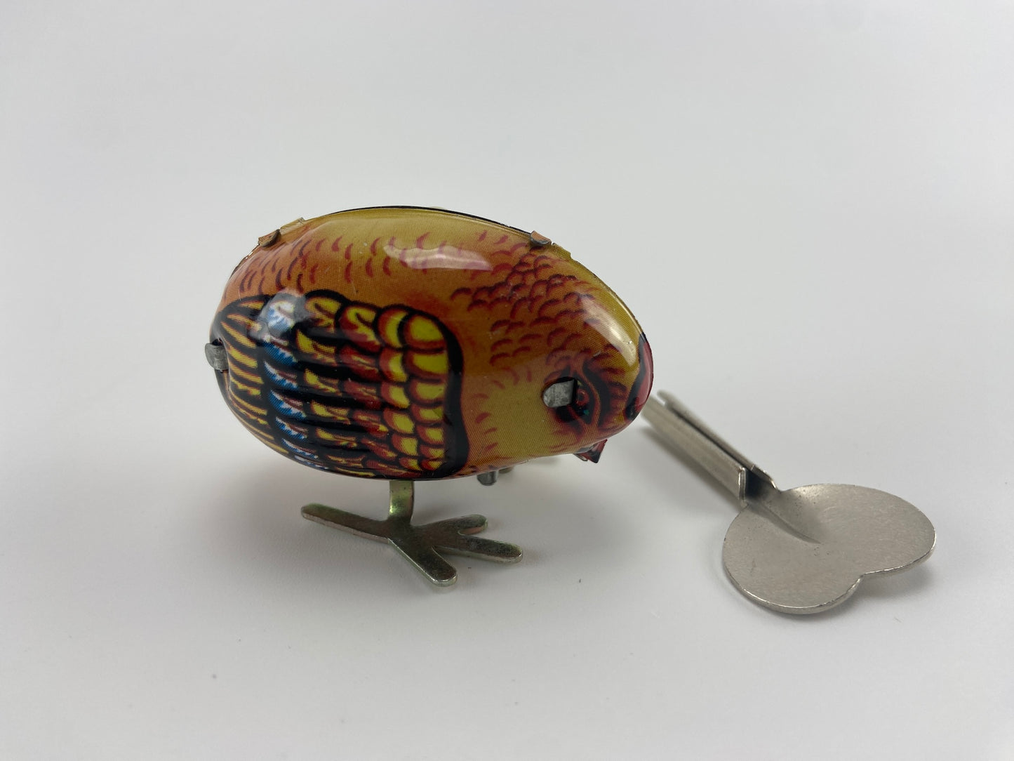 Galinha em folha de metal