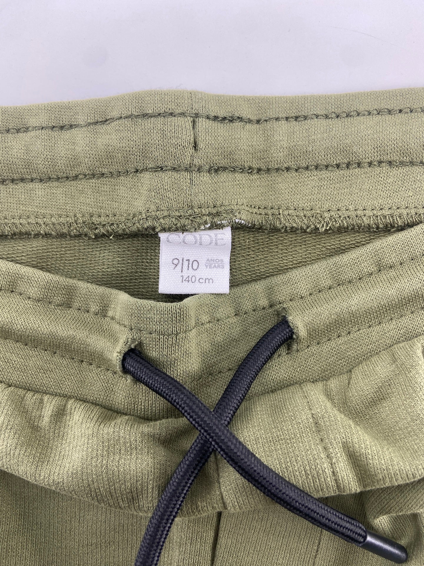 CODE Calções de treino com bolsos
