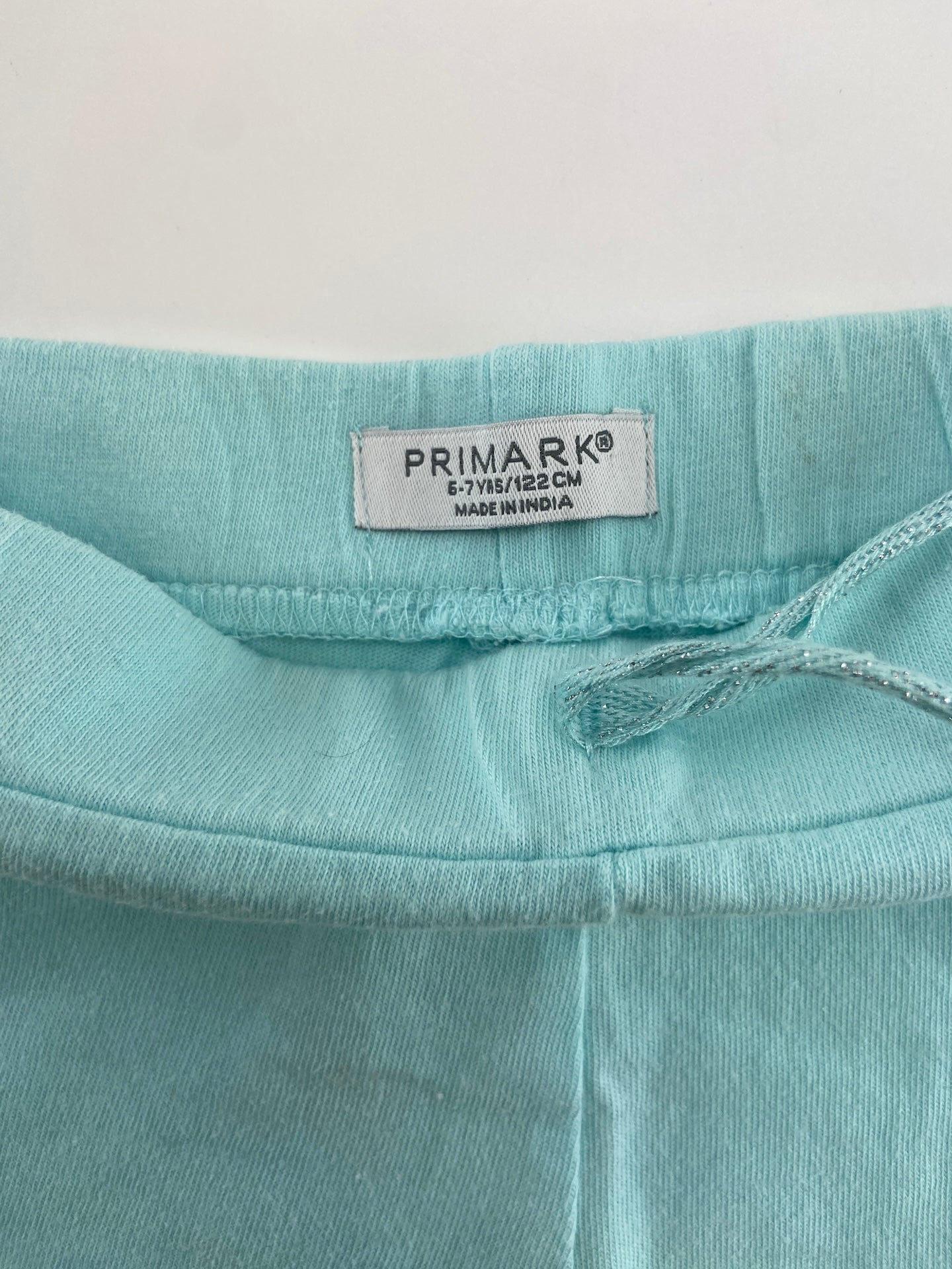 PRIMARK Calções com folho