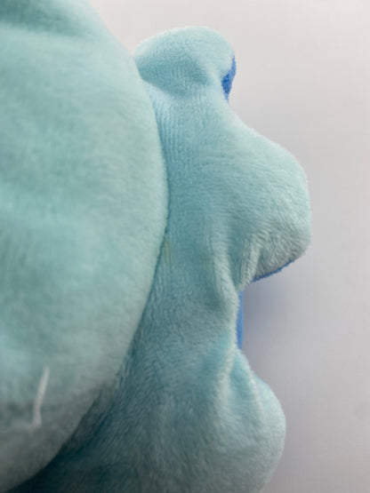 Polvo peluche dupla face