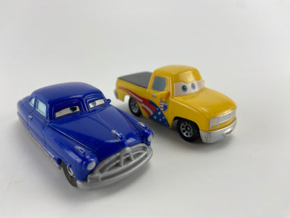 DISNEY Doc Hudson e John Lassetire do Filme McQueen
